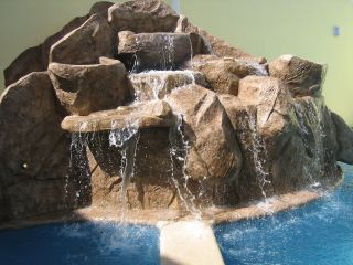 Albercas con rocas artificiales